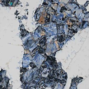 Detailed surface view of engineered quartz featuring embedded blue crystal aggregates and high-density matrix