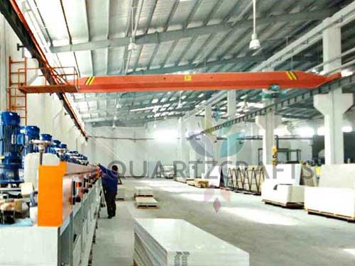Factory quality control technician performing a rigorous pre-shipment inspection on quartz slabs to meet CE, NSF, and SGS standards