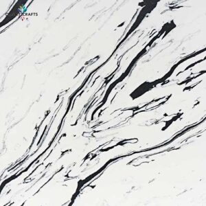 Close-up of engineered quartz slab showcasing an artistic ink-wash style veining pattern