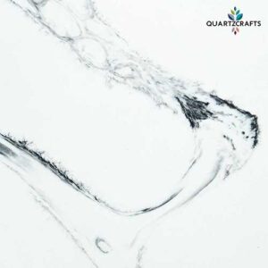 Minimalist white quartz surface detail with delicate black brush-stroke veining demonstrating precise color control