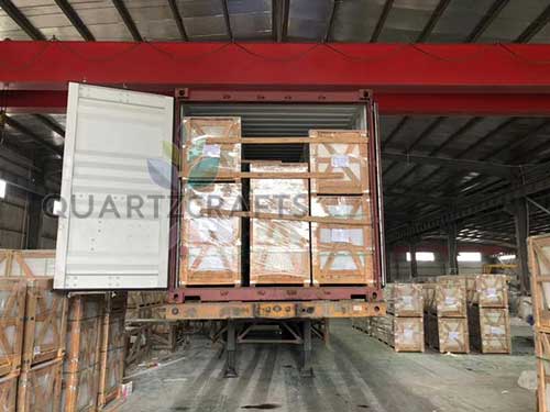 Professional export packing of engineered quartz slabs using secure wooden crates prepared for safe international ocean shipping